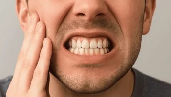 Звуки скрежета зубами